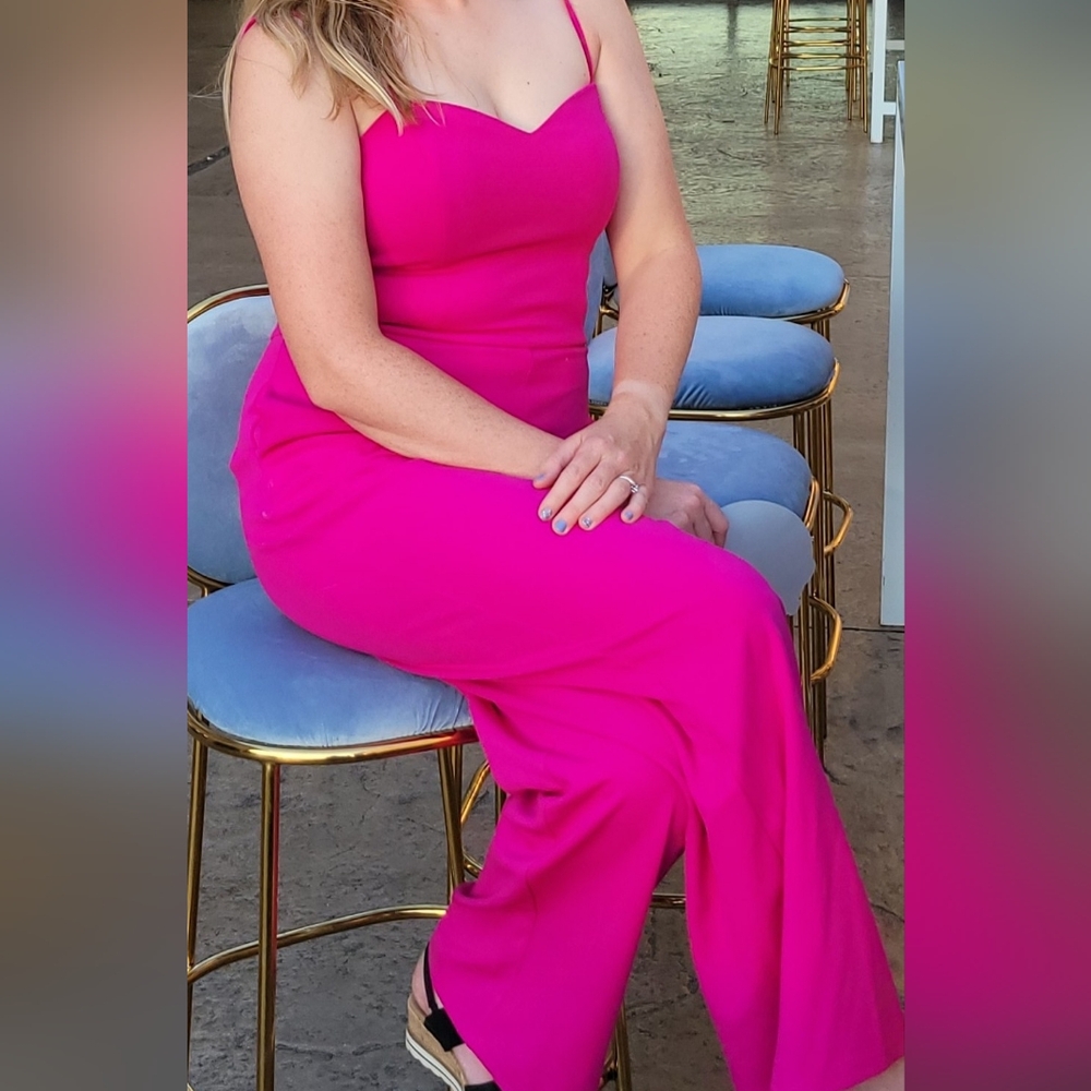 Hot pink jumpsuit.